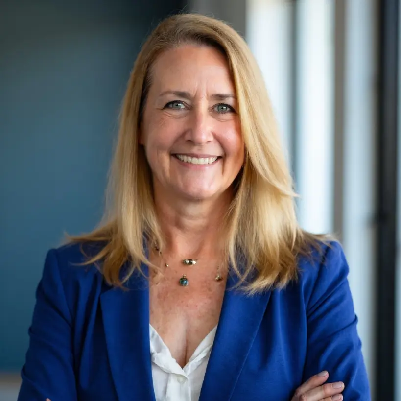 Professional headshot of Debbi Rivero, Master Agent with RE/MAX Advantage and expert real estate partner in Maryland.